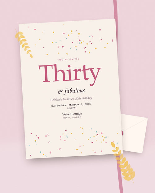 Confetti Hour milestone birthday party invitation, styled flat-lay with envelope
