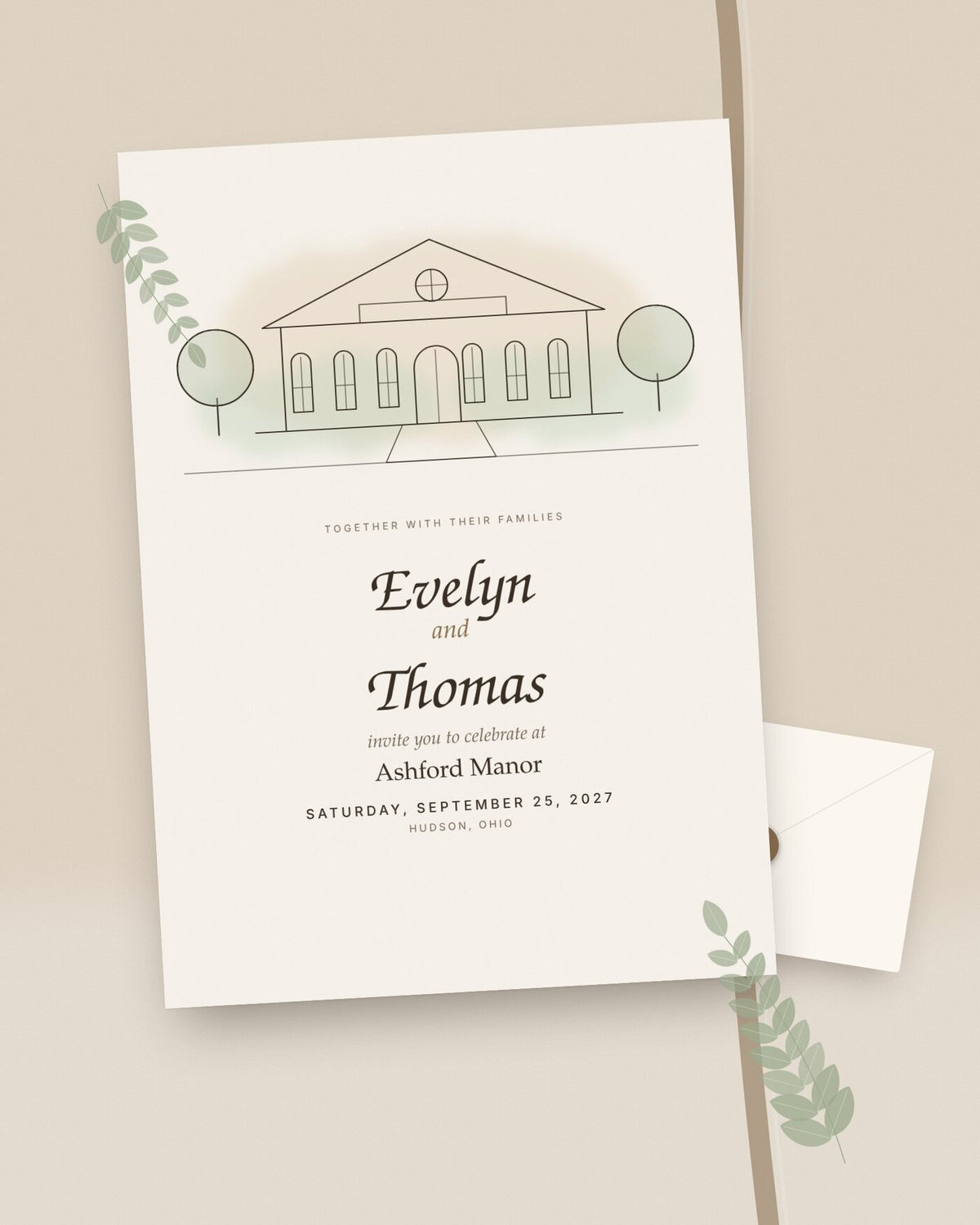 Custom illustrated venue wedding invitation with line-art manor, styled flat-lay