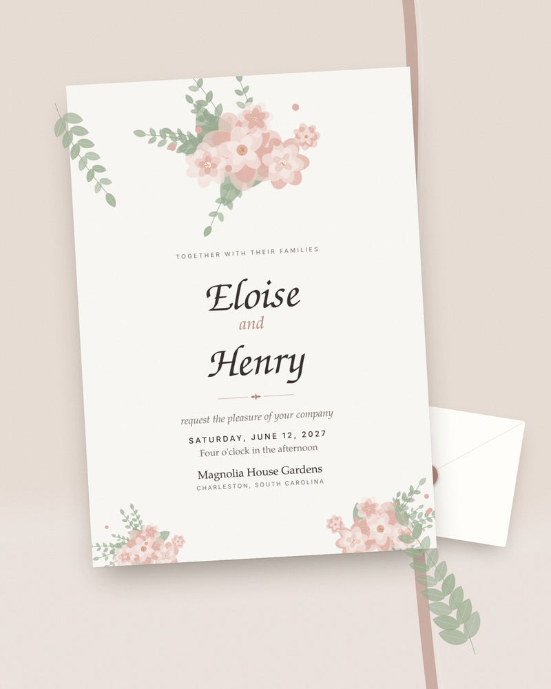 Eloise floral wedding invitation in blush and sage, styled flat-lay with envelope and greenery