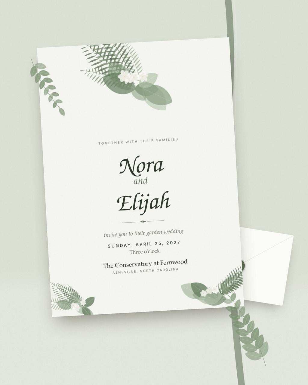 Fernwood botanical greenery wedding invitation, styled flat-lay with envelope