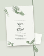 Fernwood botanical greenery wedding invitation, styled flat-lay with envelope