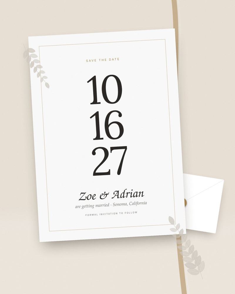 Hold the Date modern save the date with oversized date numerals, styled flat-lay