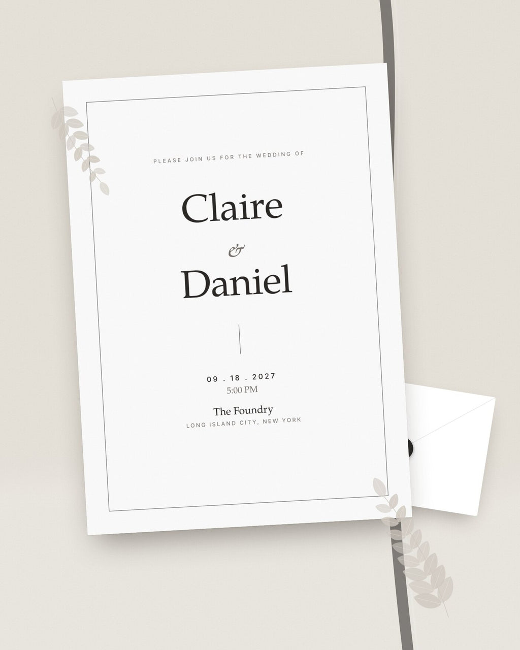 Ivory Line minimalist wedding invitation with fine-line frame, styled flat-lay