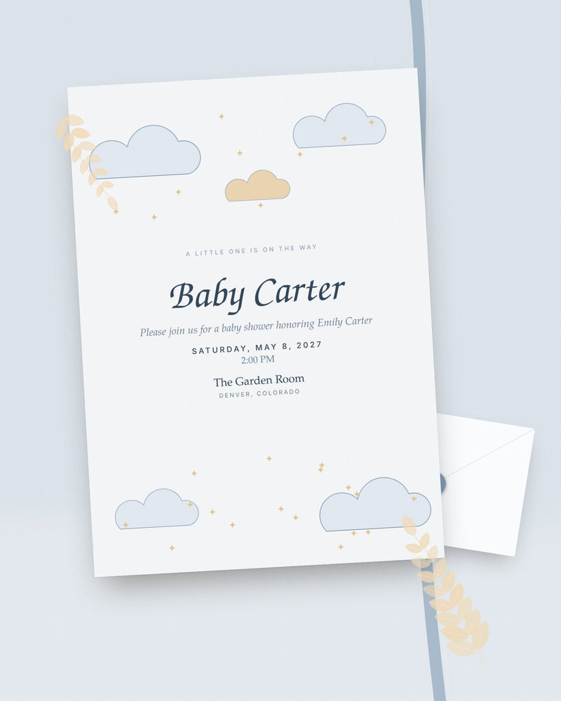 Little Cloud baby shower invitation with soft clouds and stars, styled flat-lay
