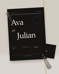 Noir Modern black and white wedding invitation, styled flat-lay with black envelope