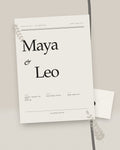 The Editorial luxury wedding invitation styled flat-lay with magazine-style typography